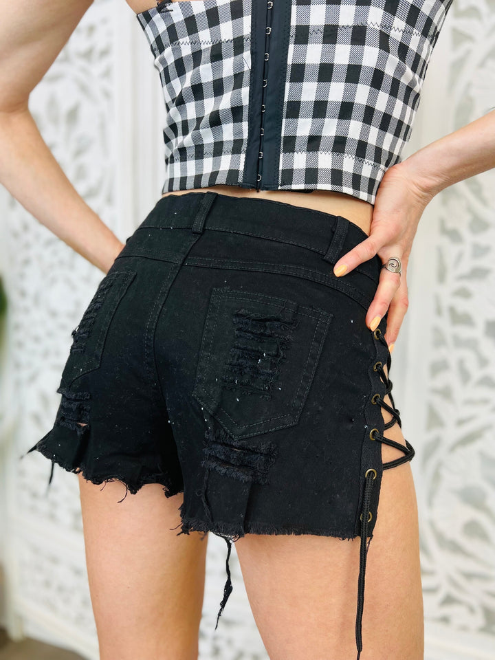 OVER IT Black Distressed Denim Lace Up Booty Shorts-Shorts-Be Wicked-Malandra Boutique, Women's Fashion Boutique Located in Las Vegas, NV